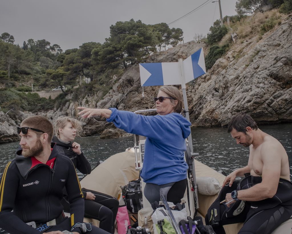 plongeuses et plongeurs sur un bateau