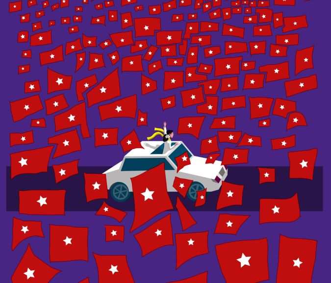 Aung San Suu Kyi en voiture avec des drapeaux rouges à étoile blanche