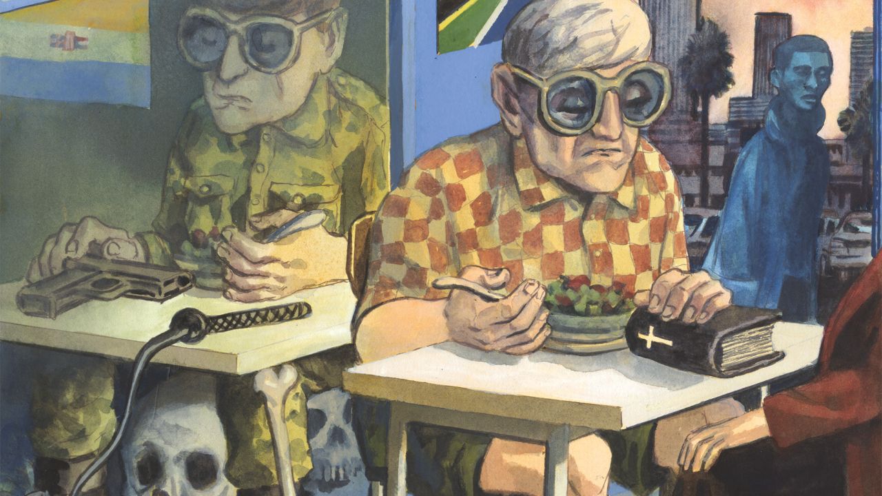 l’ancien bourreau de l’apartheid Eugene de Kock assis à une table